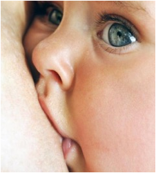 Close up of baby breastfeeding